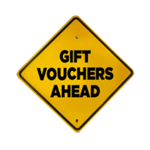 Yellow signage about gift vouchers